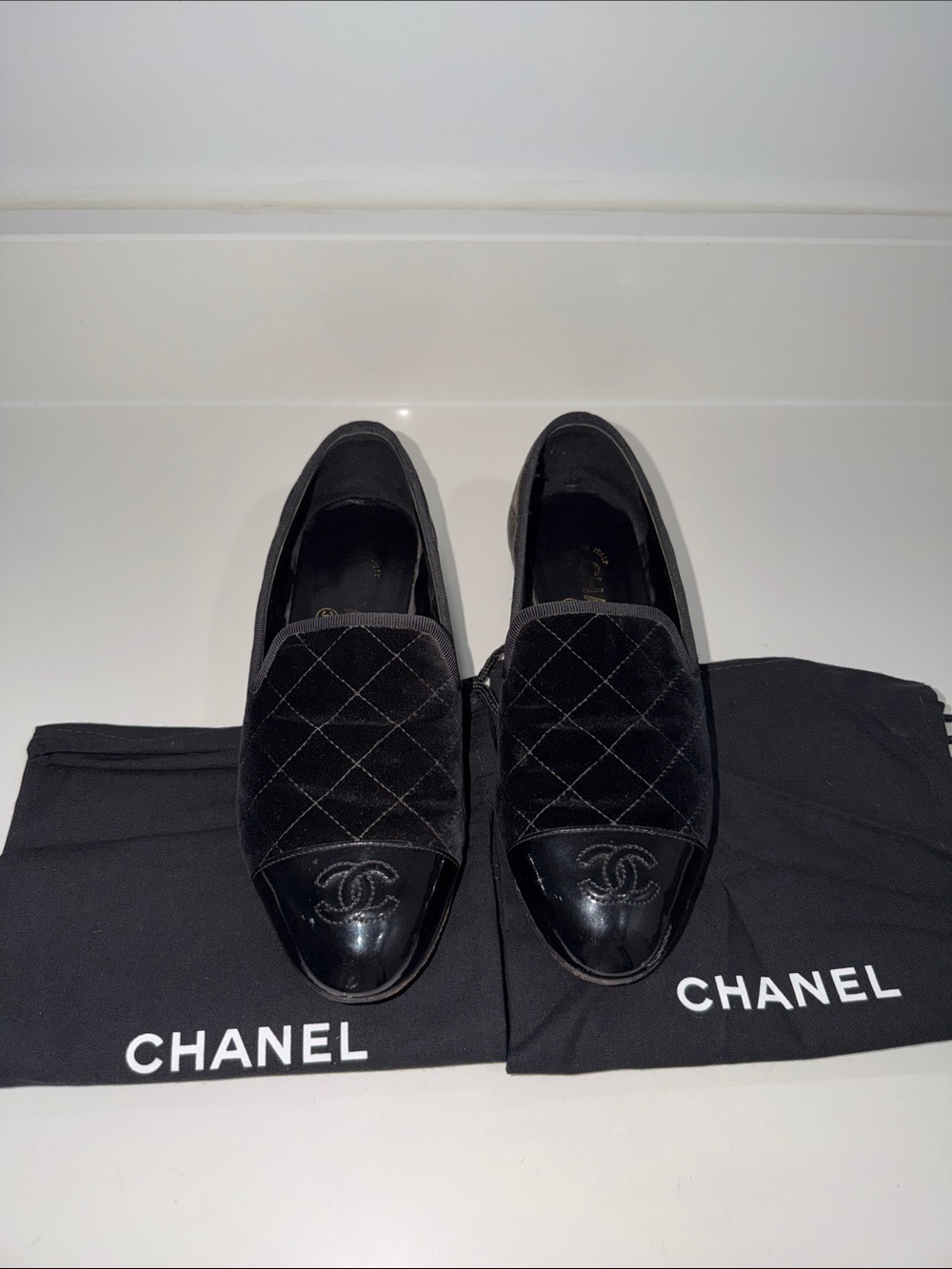 CHANEL Black Quilted Velvet & Patent Leather Slip-Ons